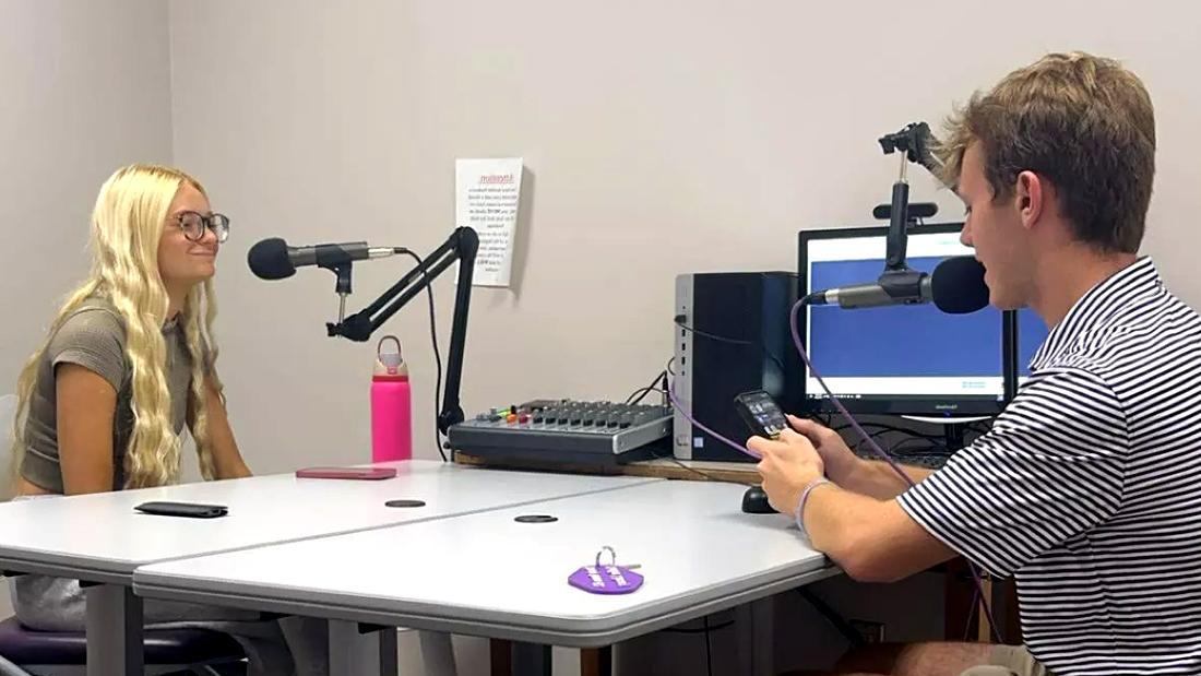 Students Brodie Riley and Kimber Boshell practice using the recording equipment as part of their podcasting class.